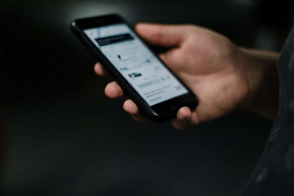 A person sharing their Uber ride with a contact to gift a ride.